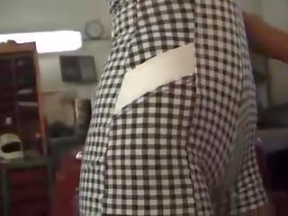 Nasty brunette double fucked in car shop
