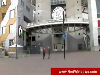 Turist guide brings a youth to the sluts