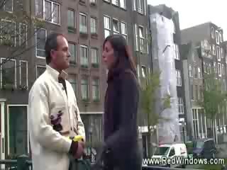 With his guide lustful turist visits a prostitutka in amsterdam