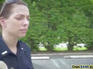 Black fellow forced by cops into threesome outdoors