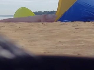 Fascinating milf spied at beach (please comment)