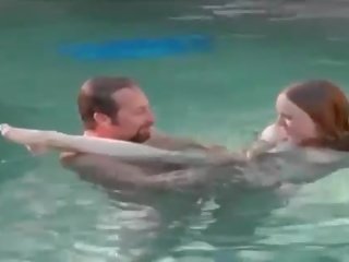 Redhead hottie eats putz underwater for cash