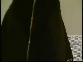 Shy German lassie taking clothes off