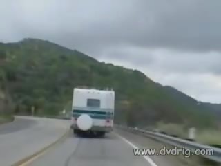 Erotic Looking Hitchhiker Hillary Scott Gets Picked Up In A Van And Keeps Two Studs Happy Inside Handling Their Two Dicks With Her Pussy