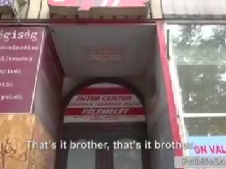Dude fucks brunette behind mejo in porno shop