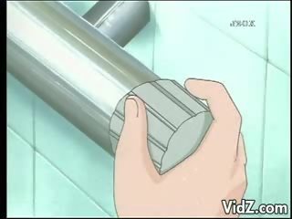 Bunch of buddies slide a dildo on a lover