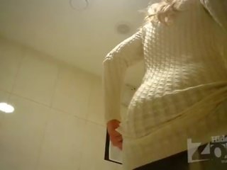 Charming blonde in toilet shaved pussy and anus closeups.