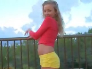 Polşaly blondinka toying on the terrace