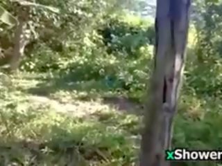 Poor mademoiselle washing her body outdoors