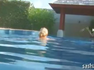 Playgirl rides a coca-cola bote