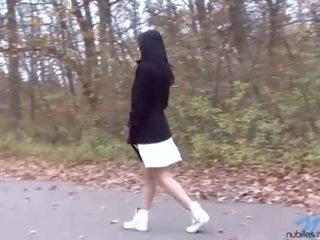 Incredible dark haired teen with huge tits pissing outdoor