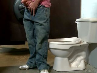 Brett squeezes in the jedhing stall with another bloke outside