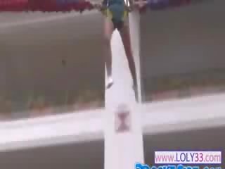 Provocative jumping of luxury brunette