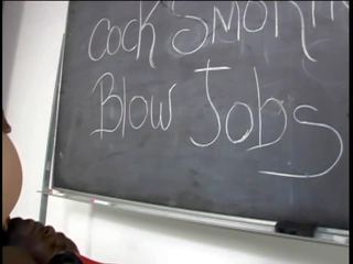 Co-ed bitch sucks huge black phallus in class room