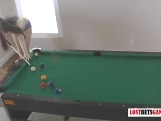 Two desirable brunettes play a game of strip billiards
