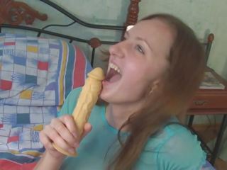 Lustful Teen in Pink Tights Fucks Herself with a Dildo.